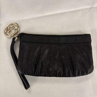 Pochette poignet noire à monogramme