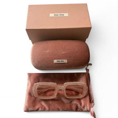 Lunettes de soleil miu miu avec strass