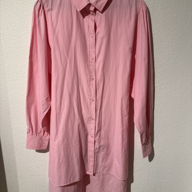Chemisier rose à manches bouffantes