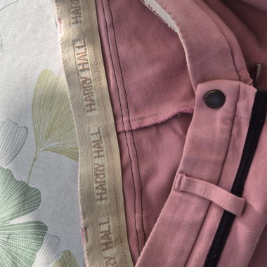 Pink and black riding breeches
