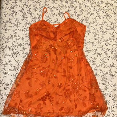 Orange Paillettenkleid