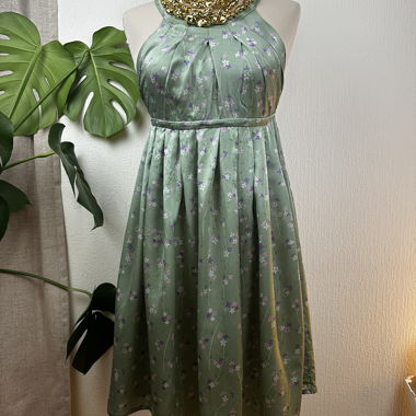Green floral silk dress with button detail
