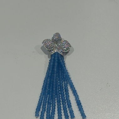 Blaue Brosche