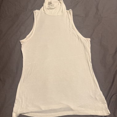 Sleeveless turtleneck top and classic top