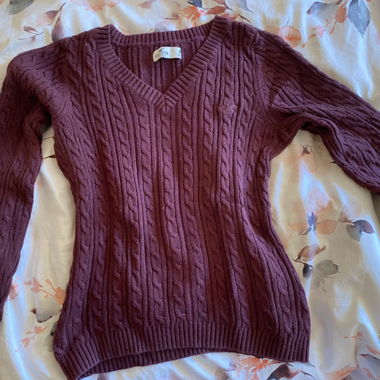 Burgundy cable-knit V-neck sweater