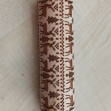 Wooden rolling pin with reindeer motif