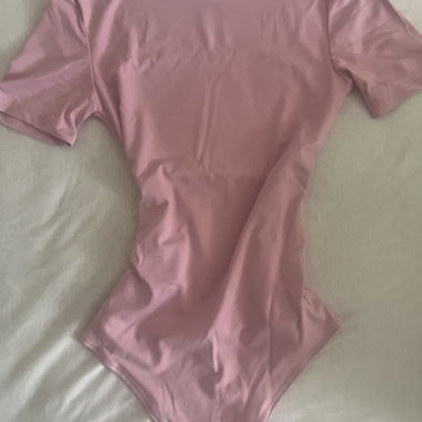 Pink bodysuit