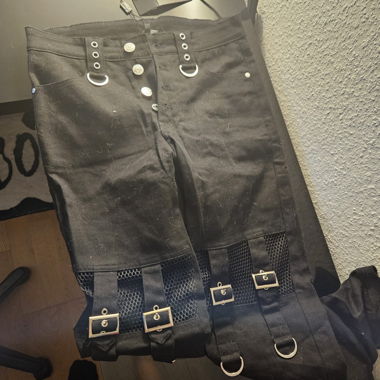 Banned pants with buckles