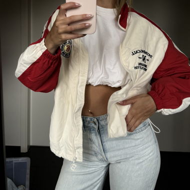 Veste coupe-vent bicolore rouge/blanc