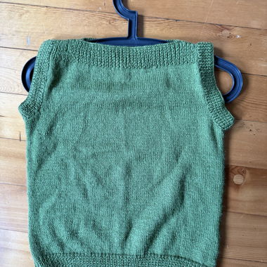 Green knitted sleeveless top