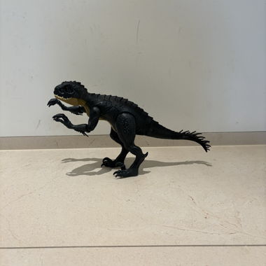 Schwarze Dinosaurier-Figur