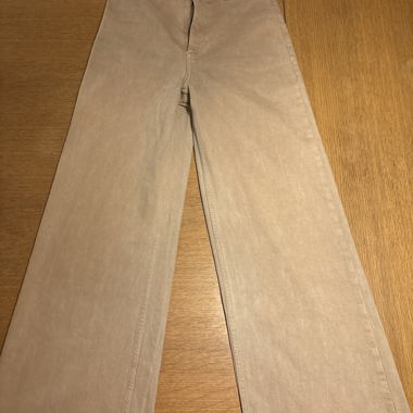Pantaloni beige a taglio ampio