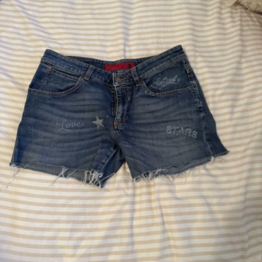 Short en jean à franges