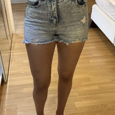Corti di jeans strappati da donna - Taglia S