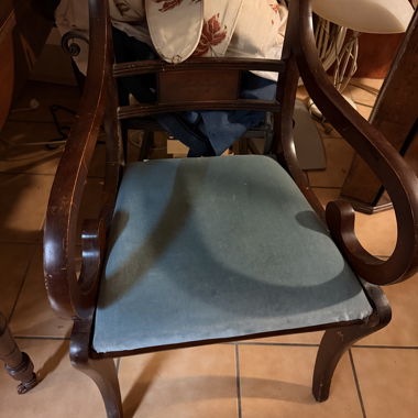 Upholstered wooden armchair