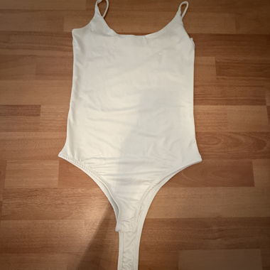 Body bianco con spalline spaghetti