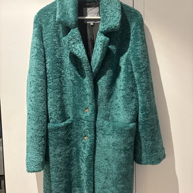 Manteau duveteux turquoise