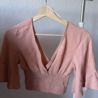 Rosa Wickel-Crop-Top