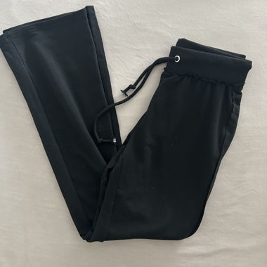 Pantaloni in tessuto neri a zampa