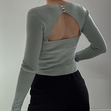 Pull vert pastel dos nu