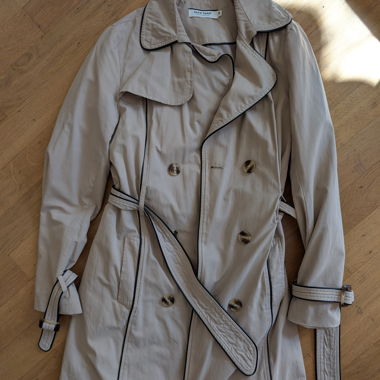 Beige belted trench coat for women