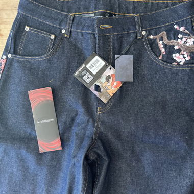Jeans derSchutze con ricamo floreale