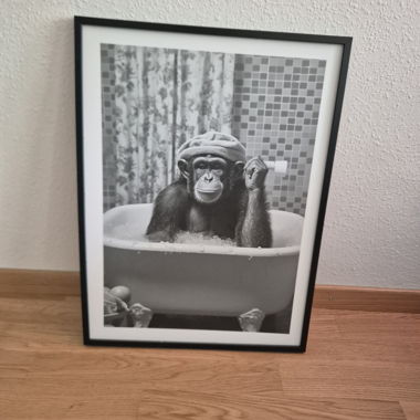 Black photo frame with monkey motif