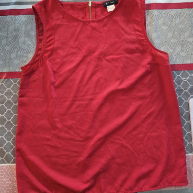Red sleeveless top