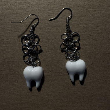Boucles d'oreilles dent