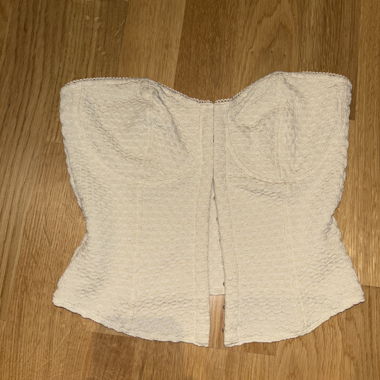 Top senza spalline color crema