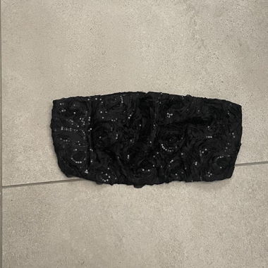 Top bandeau nero glitterato con dettagli