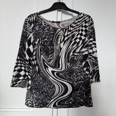Top stampato psichedelico bianco e nero