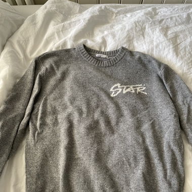 subdued sweater