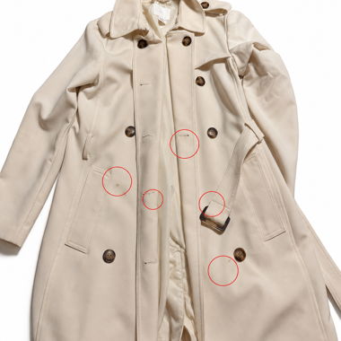 Beige Trench Coat with Signs of Wear