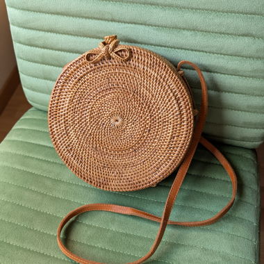 Borsa a tracolla rotonda intrecciata