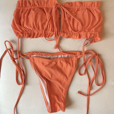 Completo bikini arancione fluo e gonna