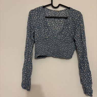 Top corto a maniche lunghe floreale
