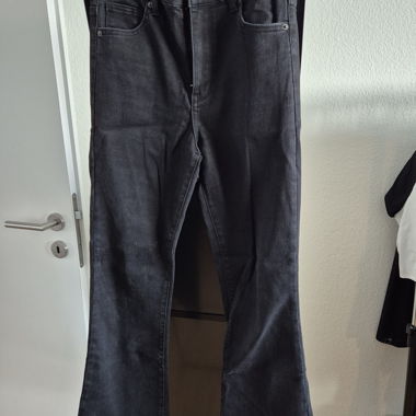 Black flared trousers