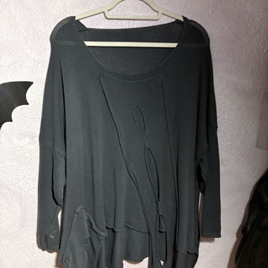 Abgenutzter Strickpullover