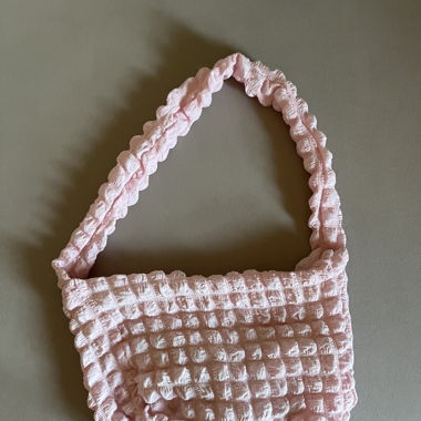 pink puffer bag