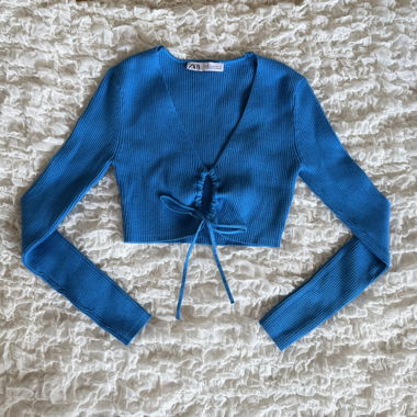 blue/turquoise longsleeve top with front-tie