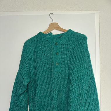 Pull en tricot vert