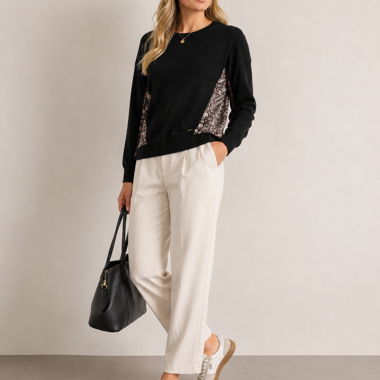 Maglione nero con motivo floreale