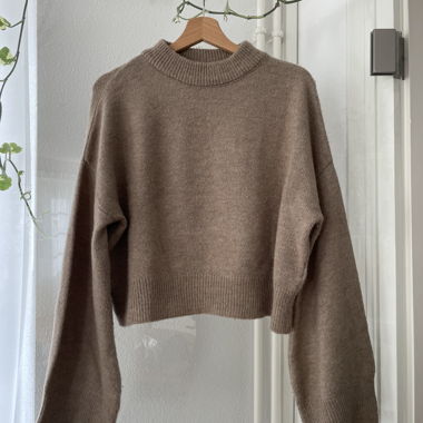 Maglione in maglia con maniche ampie