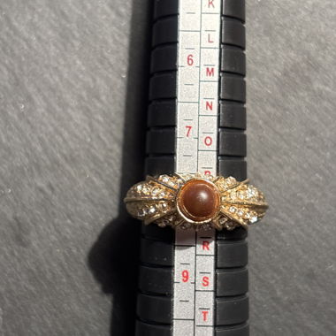 Ring with brown stone