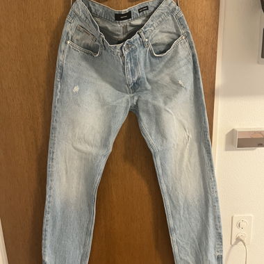 Lichte Jeans mit Reissverschluss