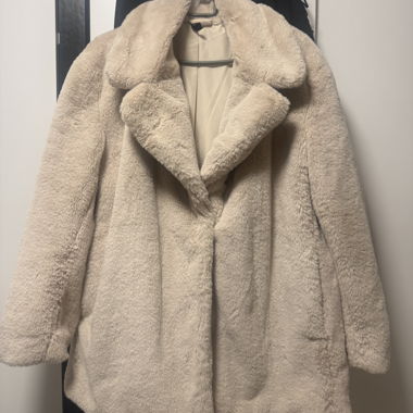 Beige faux fur coat