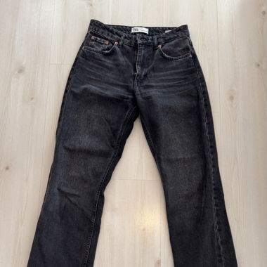 Mid-waist straight legged black jeans