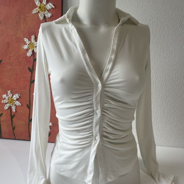 White ruffle- front shirt