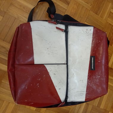 Freitag's classic red and white bag